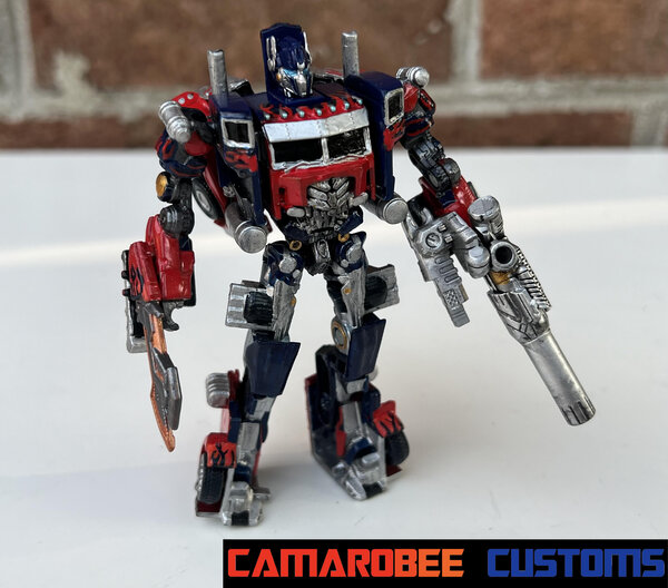 Prime bot both weapons.jpg