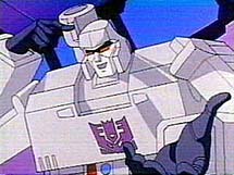 Megatron points at his head