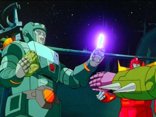 Kup holding an Energon goody