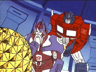 Optimus stands behind Alpha Trion