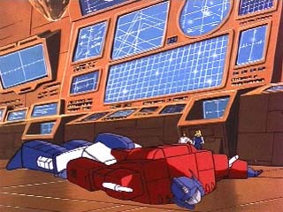 Optimus laying down on the ground