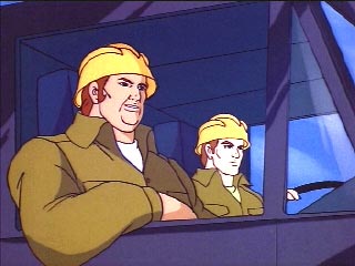 Two construction workers in a truck