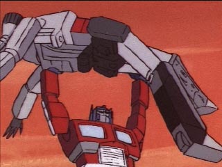 Optimus Prime holds Megatron over his head